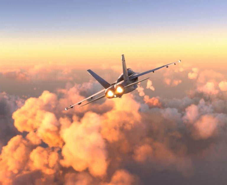 Militar,Aircraft,Flying,Over,The,Clouds,In,Amazing,Sunset Militar,Aircraft,Flying,Over,The,Clouds,In,Amazing,Sunset